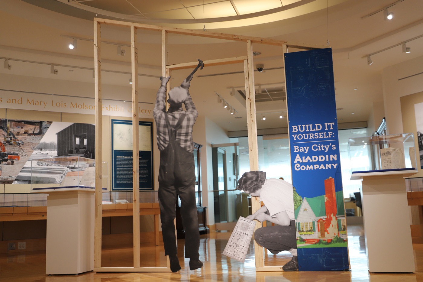 AladdinExhibit2025 View of the Clarke's exhibit, showing a frame for a wall being constructed.
