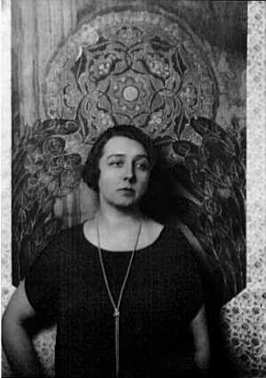 A black and white picture of a woman looking to the side.