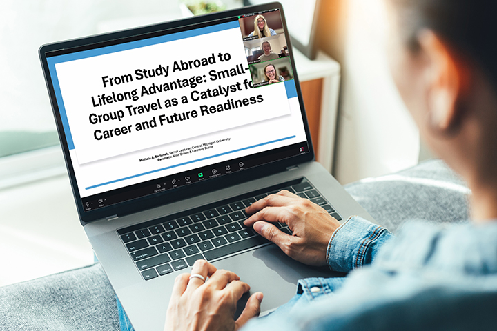 A person looks at a laptop screen that shows CMU speakers and a slide that reads 