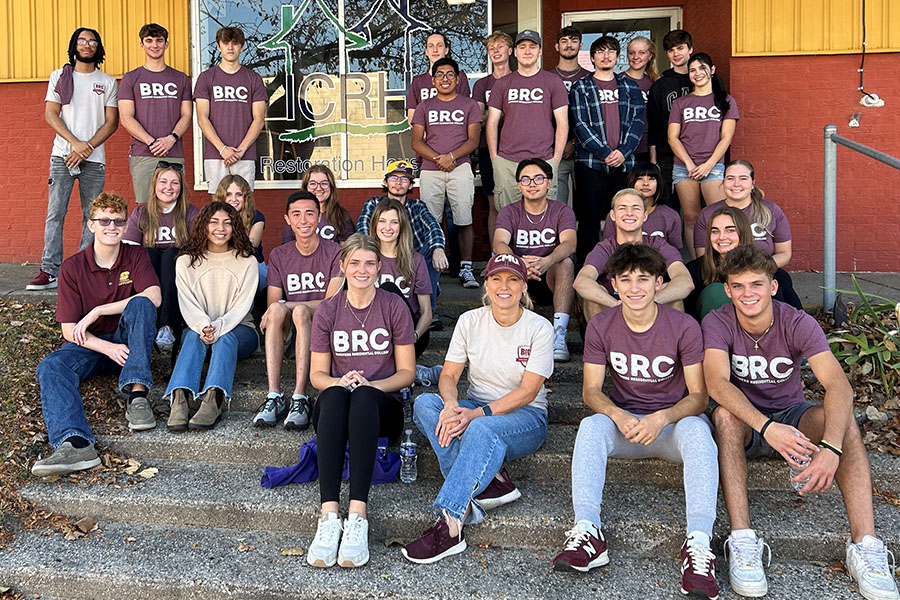 Lori Driessnack, director of the Business Residential College, shares a moment with students in the community she’s helped shape—fostering leadership, belonging, and professional growth from day one.