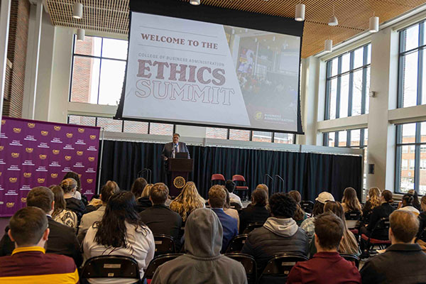 Dean Moberg giving introduction to Ethics Summit.