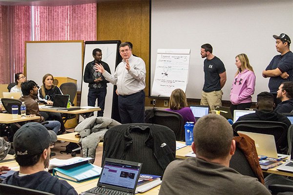 Lean Six Sigma workshop with a professor instructing the class