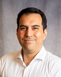 Plate-Peirano, Alberto Alberto Plate-Peirano is wearing a white button down shirt.