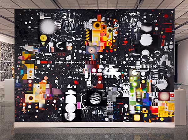 Artwork by Martin Venezky, multicolored collage of geometric shapes