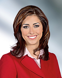 Headshot of Catherine Bodak with a soft blue backdrop.