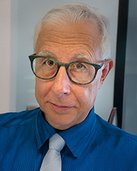 Tight close up on Neil Hopp's face.