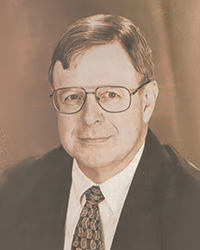 Headshot of JimWojcik, a greyscale image cut from a newspaper