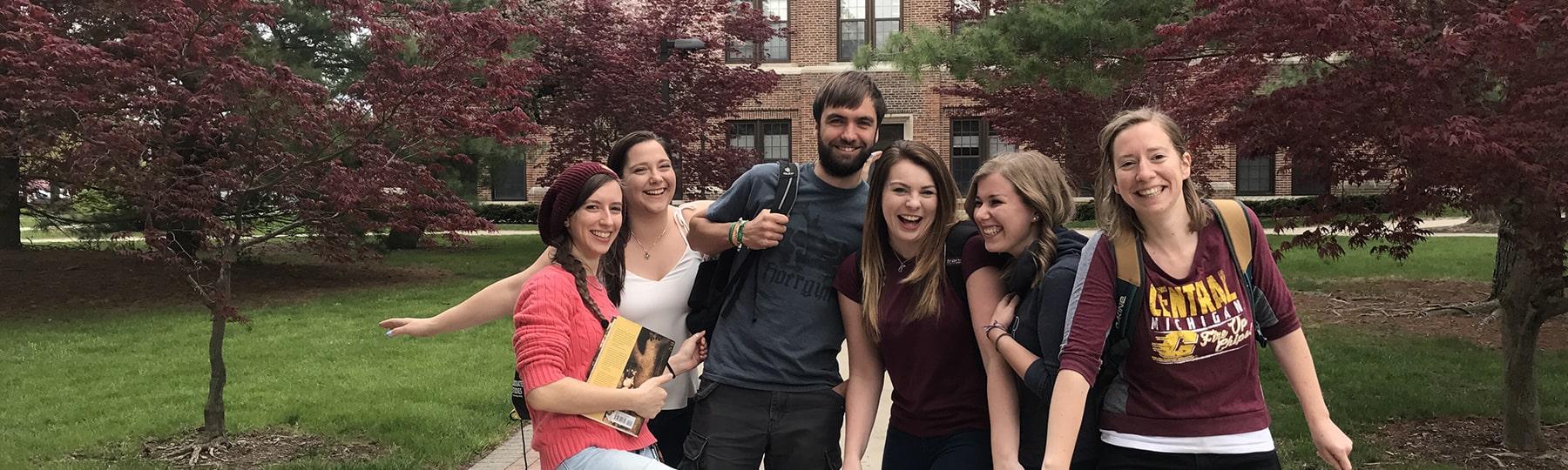 Happy history graduate students near Warriner Hall