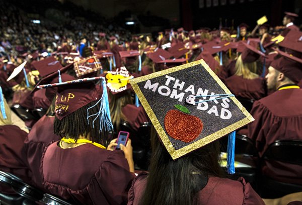 Student in caps and gowns at graduation