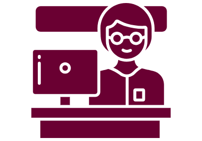 Person sitting at a desk in front of computer screen