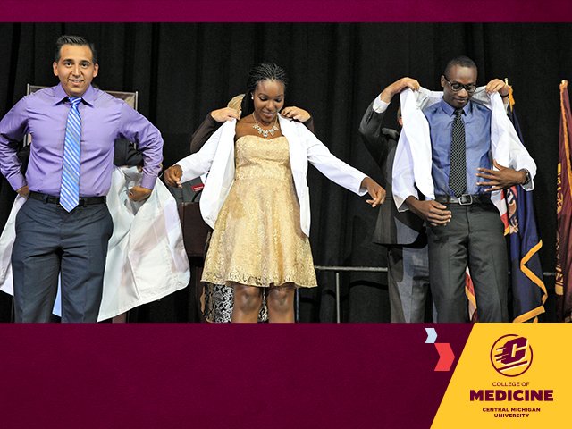 Three medical students dressed in formal attire put on new white medical coats with a dark black curtain in the back, the College of Medicine logo in the lower right corner on a gold diagonal shape, two chevrons point toward it, on a maroon background.