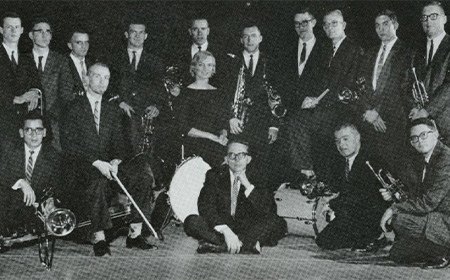 A group of musicians posing for a photo.