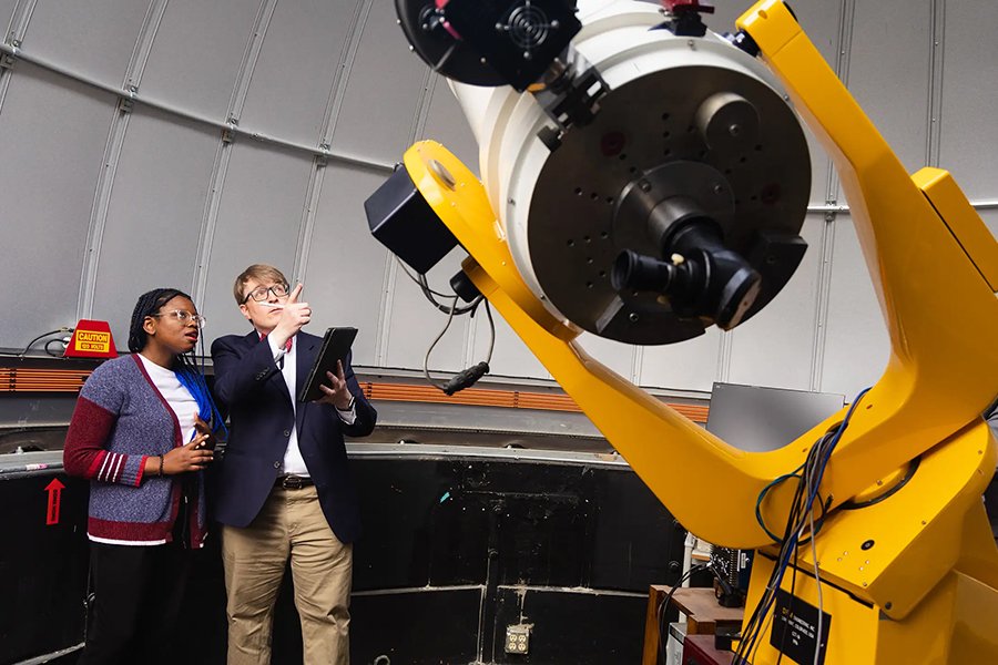 900x600-observatory Student and professor point to large telescope in CMU's Brooks Observatory