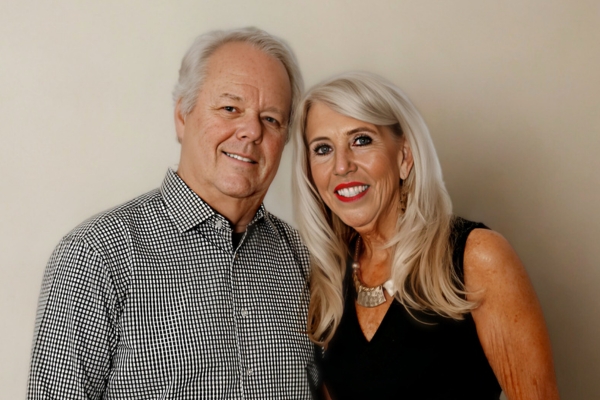 a man and woman posing for a picture